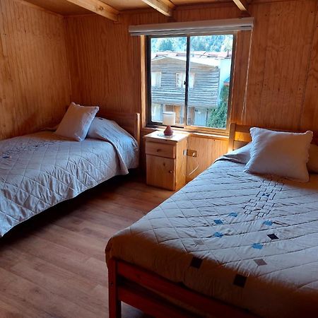 Hostal Y Cabanas Ventisquero Puerto Puyuguapi Bagian luar foto