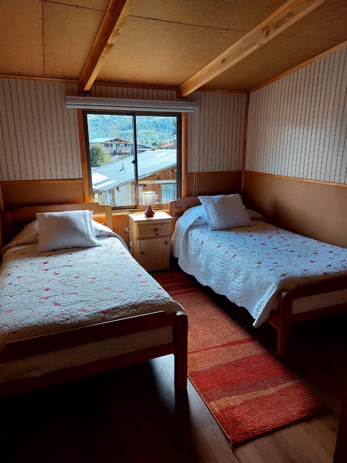 Hostal Y Cabanas Ventisquero Puerto Puyuguapi Bagian luar foto