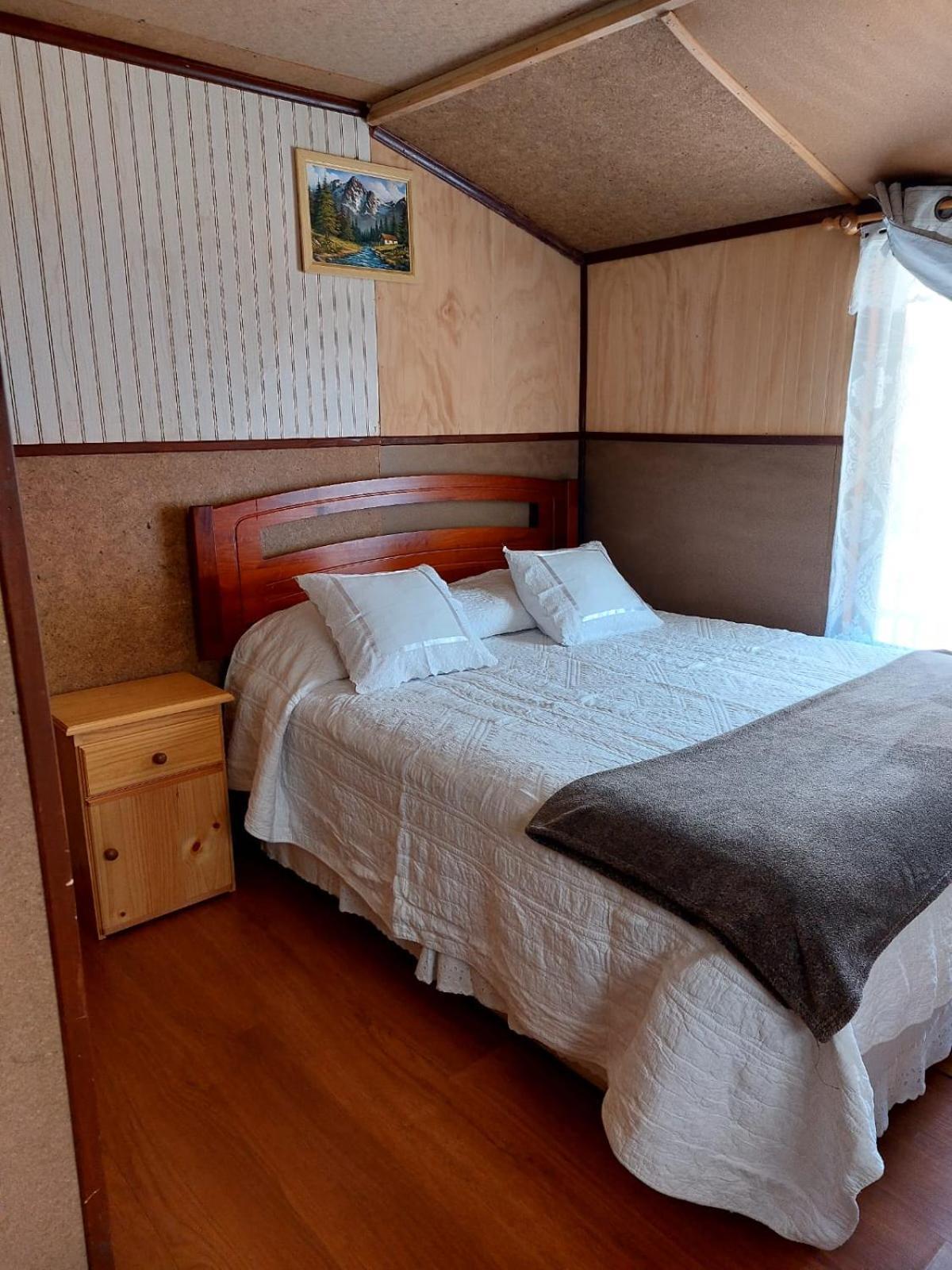 Hostal Y Cabanas Ventisquero Puerto Puyuguapi Bagian luar foto