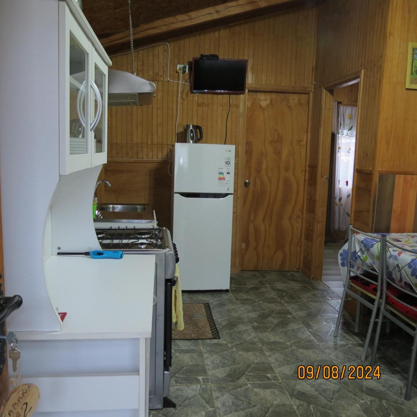 Hostal Y Cabanas Ventisquero Puerto Puyuguapi Bagian luar foto