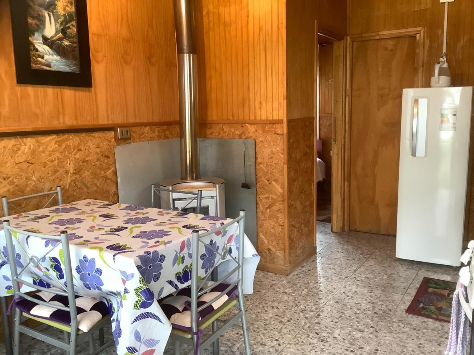 Hostal Y Cabanas Ventisquero Puerto Puyuguapi Bagian luar foto