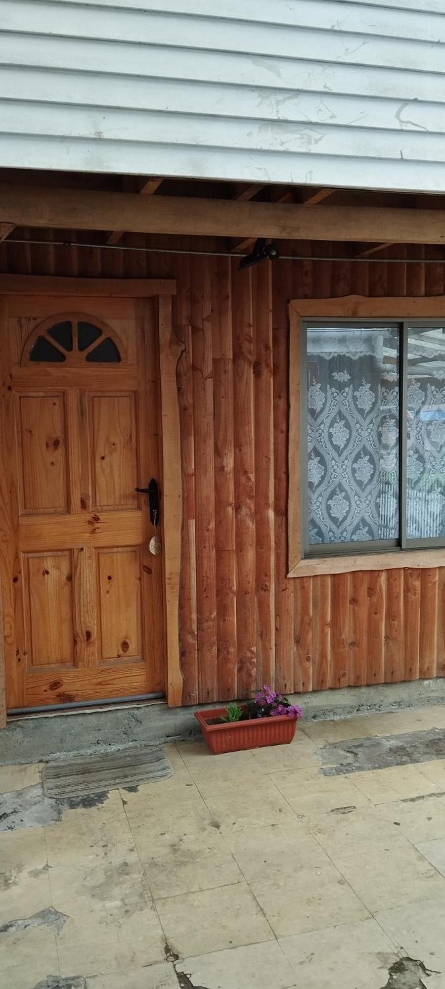 Hostal Y Cabanas Ventisquero Puerto Puyuguapi Bagian luar foto