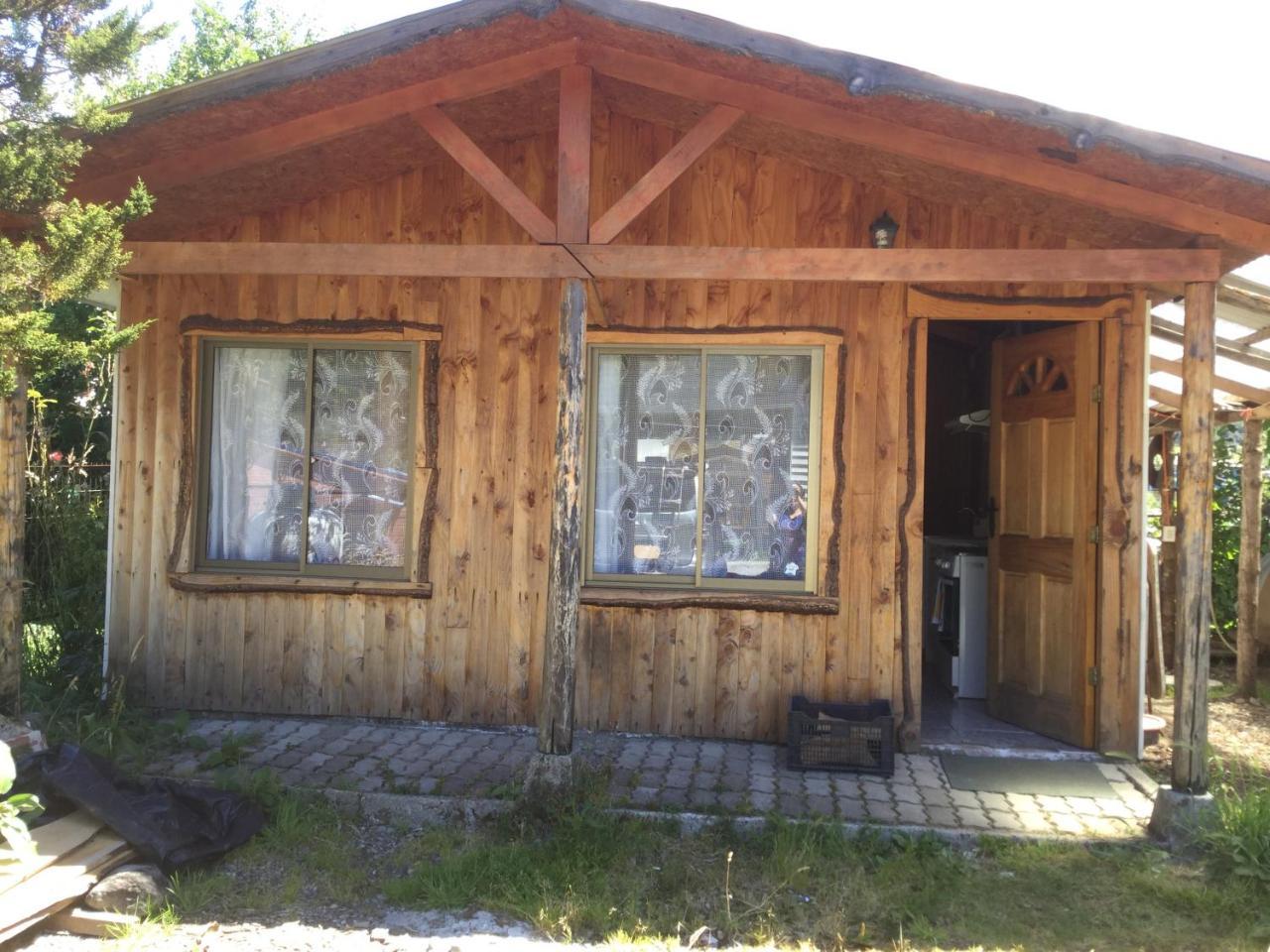 Hostal Y Cabanas Ventisquero Puerto Puyuguapi Bagian luar foto